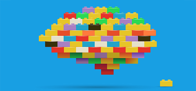 Colorful toy bricks in the shape of a brain