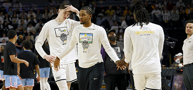VCU Rams warm up in their CHoR shirts