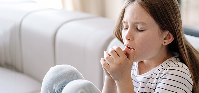 Girl coughing