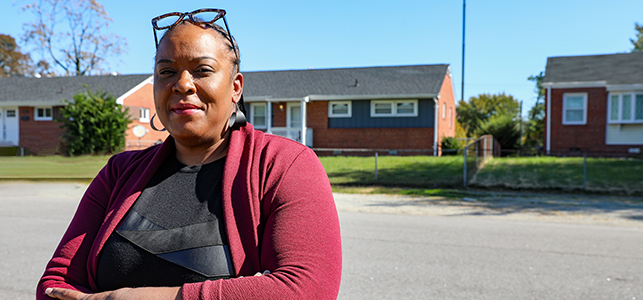 CHoR's Dr. Crewe standing in her old neighborhood in Richmond's southside