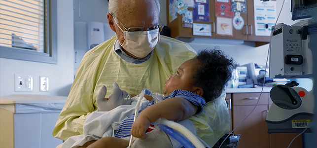 A retiree’s gentle touch soothes babies in the NICU