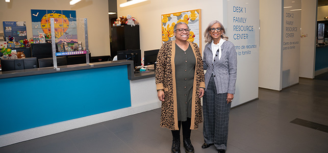 Shavonda Joyner and Kimberly Lewis stand in front of the current Family Resource Center in the Children's Pavilion
