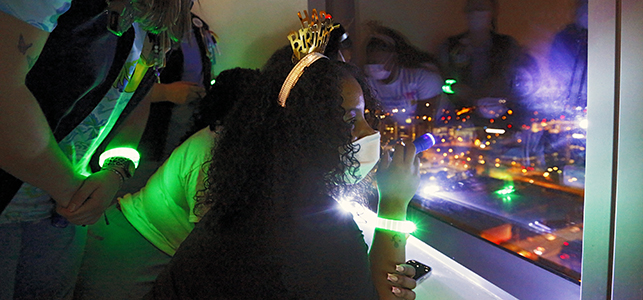 CHoR nurse looks out the window at goodnight lights