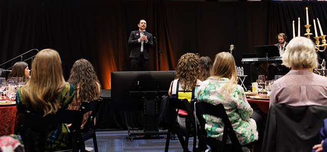 Miguel Cervantes talks to the crowd at the 2026 Children's Hospital Foundation Words & Wisdom event