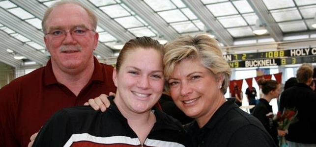 CHoR patient Jenna Jacoby with her parents at a college swim meet
