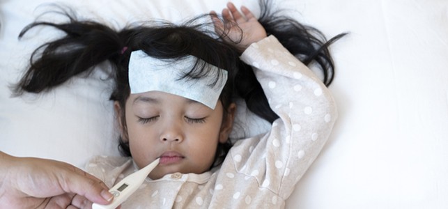 child with thermometer