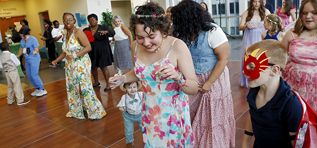 Patients and providers take full advantage of the dance floor at this year's oncology prom