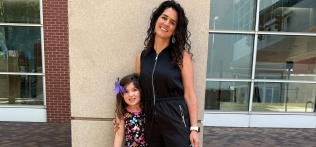 CHoR patient Nina Roberts smiling with her mom Kristin