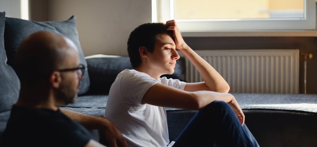 father and son talk about mental health concerns