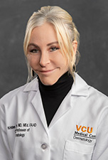 Kristen  Savola, MD
